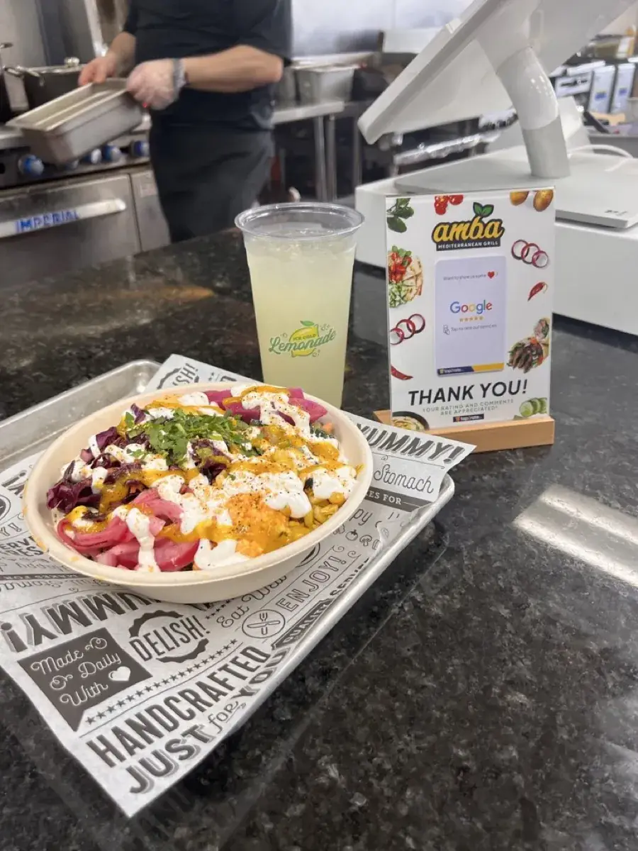 A finished AMBA bowl and a lemonade on the counter